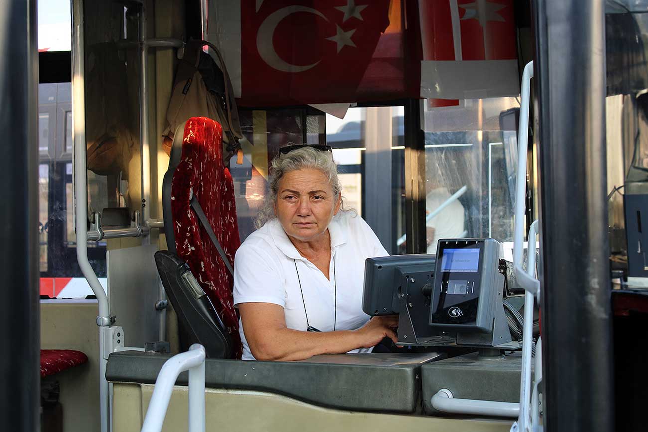Kaya says her father and her two sons – who she raised on her own – all objected at first to her working as a bus driver. © Umut Akar