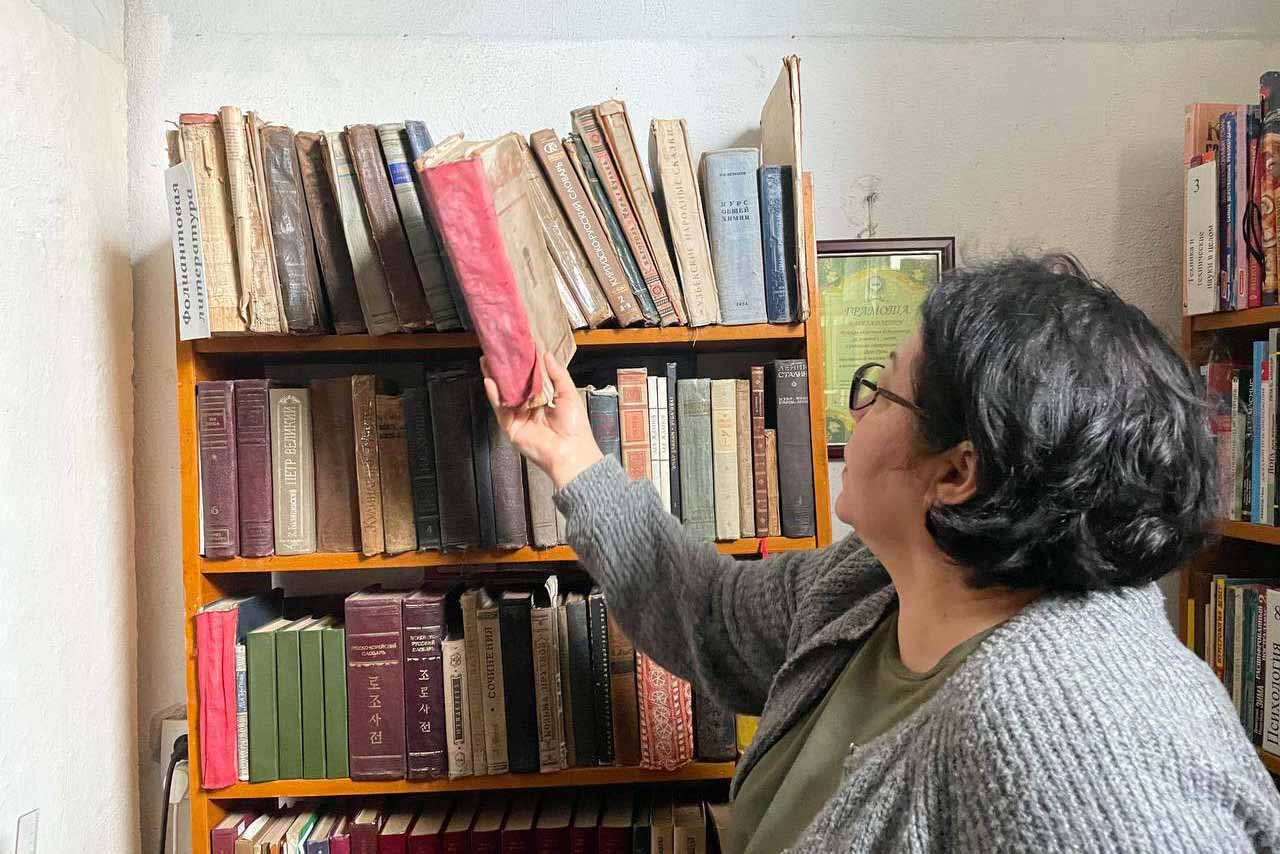 Tamila Kadzhieva heads the regional public library of the Chuy region, Kyrgyzstan’s northernmost, in the town of Kant. “Libraries are windows into other worlds,” she says. © IWPR Central Asia