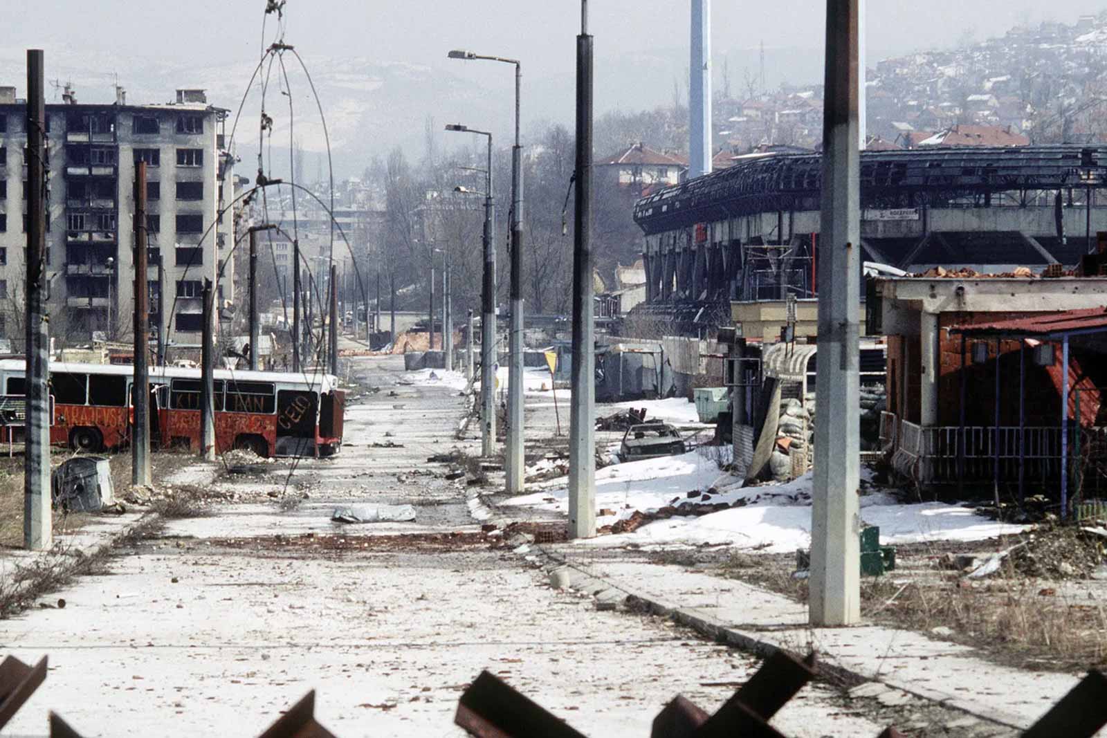 Buildings and vehicles destroyed in Grbavica, a suburb of Sarajevo, Bosnia and Herzegovina, during the Bosnian conflict (1992–95). © Lt. Stacey Wyzkowski/U.S. Department of Defense